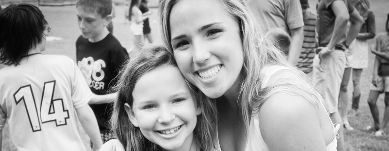 Stella (2 yrs at camp) gets some QT with Kelsey (7 yrs).