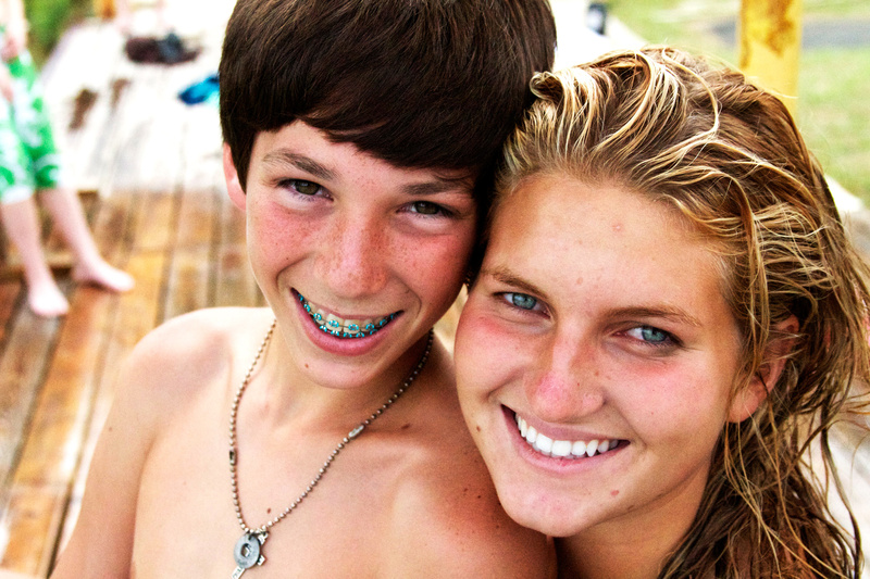 Kole (7 yrs at Huawni) hangs with his favorite counselor and head lifeguard, Summer (1st yr) at the Critter Pond (Waterfront Area). Kole loves camp because he gets to hang out with over-the-top counselors like Summer.