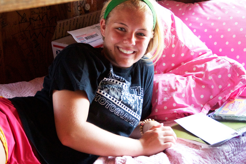 Claire (4 yrs at camp) just got done reading a letter she got at Mail Call- which happens everyday at lunch. It's a big deal to get mail at Camp. 